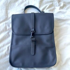 Rains Backpack micro in black, used three times. Fits 13” laptop